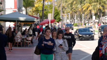 Crowded Ocean Drive at South Beach on a sunny day - MIAMI, FLORIDA - FEBRUARY 14, 2022のeditorial素材