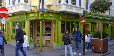 Amazing Irish pubs in the Temple Bar Quarter in Dublin - DUBLIN, IRELAND - APRIL 20, 2022のeditorial素材