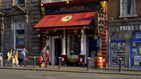 Irish Pub in the Temple Bar District of Dublin - DUBLIN, IRELAND - APRIL 20, 2022のeditorial素材