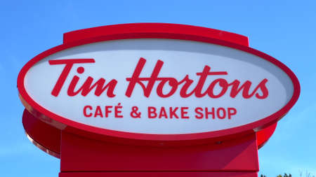 Tim Hortons Cafe and Bake Shop - BELFAST, UK - APRIL 25, 2022のeditorial素材