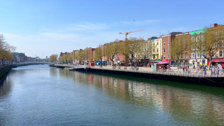 River Liffey in the city center of Dublin - DUBLIN, IRELAND - APRIL 20. 2022