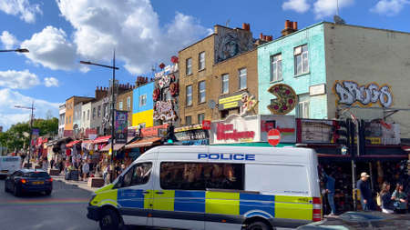 The colorful shops and crazy houses at Camden High Street in London - LONDON, UK - JUNE 9, 2022のeditorial素材