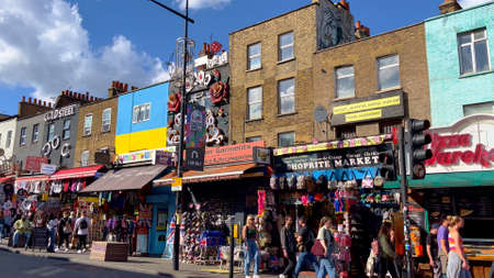 The colorful shops and crazy houses at Camden High Street in London - LONDON, UK - JUNE 9, 2022