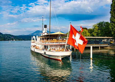 Sightseeing boat on Lake Lucerne - LUCERNE, SWITZERLAND - JULY 14, 2022のeditorial素材
