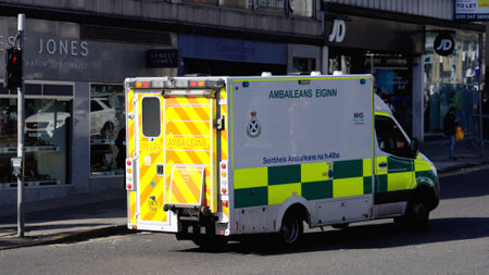 Ambulance car in the city of Edinburgh - ermergency - EDINBURGH, SCOTLAND - OCTOBER 04, 2022