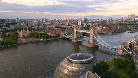 Aerial view over Tower Bridge and River Thames in London at sunset - LONDON, UK - JUNE 9, 2022のeditorial素材