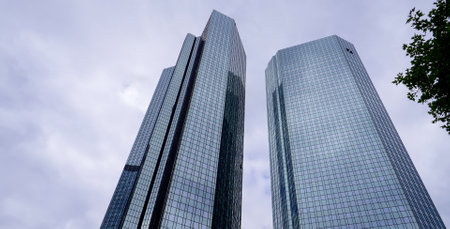 Deutsche Bank Twin Towers in the financial district in the city of Frankfurt - FRANKFURT, GERMANY - JULY 12, 2022のeditorial素材