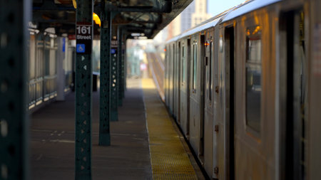 Open air subway train station in New York - NEW YORK CITY, USA - FEBRUARY 14, 2023のeditorial素材