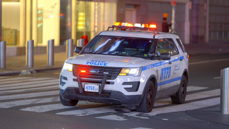 NYPD New York Police Car on duty - NEW YORK CITY, USA - FEBRUARY 14, 2023のeditorial素材