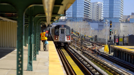 Subway Line 7 arriving at station - NEW YORK CITY, USA - FEBRUARY 14, 2023のeditorial素材