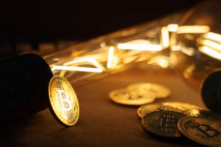 BTC among avid bulbs. The light flashes, an electrical short circuit. Closeup, Shallow depth of fields.の写真素材