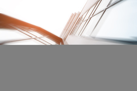 Wide angle abstract background view of steel light blue high rise commercial building skyscraper...