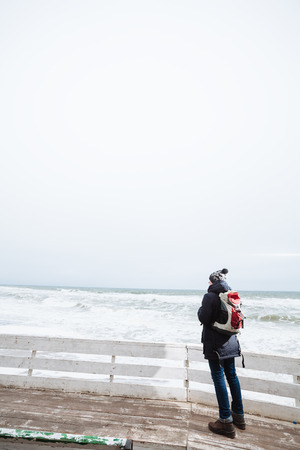 Hiker looking at beautiful ocean viewsの写真素材