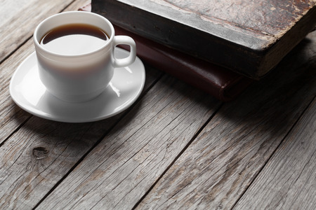 Cup of hot coffee on wooden tableの写真素材
