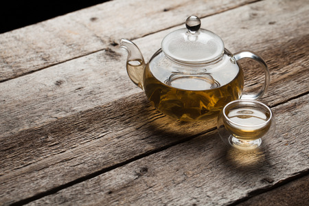 Green tea with jasmine a in a glass teapotの写真素材