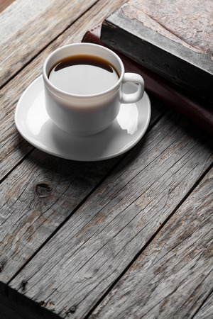 Cup of hot coffee on wooden tableの写真素材