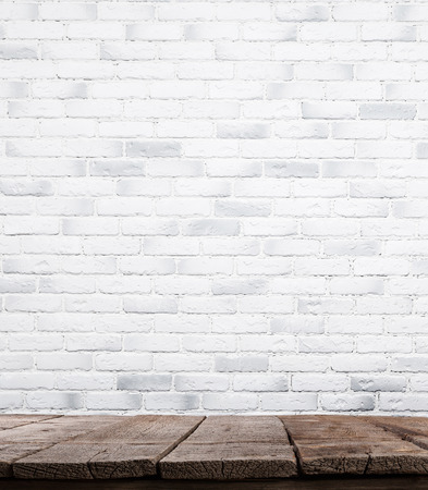 interior vintage with white brick wall and wood floor backgroundrの写真素材