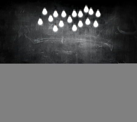 dark space background with light bulbsの写真素材
