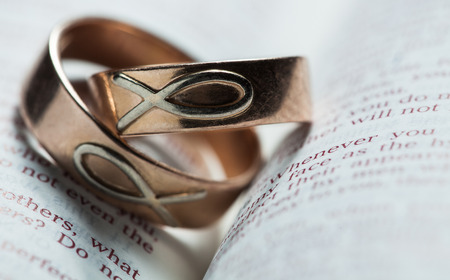 wedding rings on a bibleの写真素材