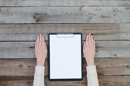 paper with woman handsの写真素材
