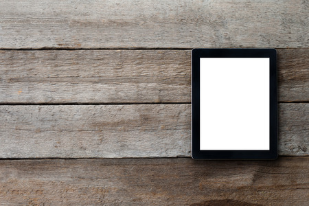digital tablet on the table with isolated screen for your image and a copy spaceの写真素材