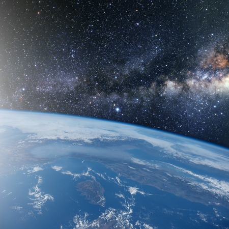 image of stars and a planet in the galaxy.の写真素材