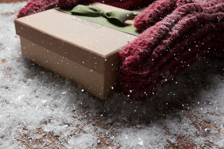 Hands holding Rustic Decorated Christmas Giftの写真素材