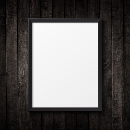 Blank black picture frame on the grunge wood texture. background old panelsの写真素材