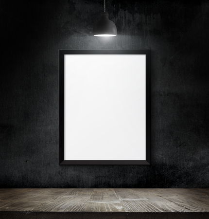 Empty poster over blackboard background with copy spaceの写真素材