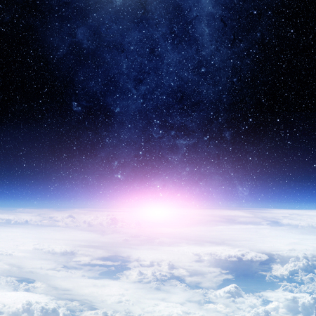 Clouds of Earth planet and star sky on the background.  の写真素材