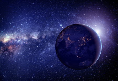 Planet earth from the space in the middle with stars. の写真素材