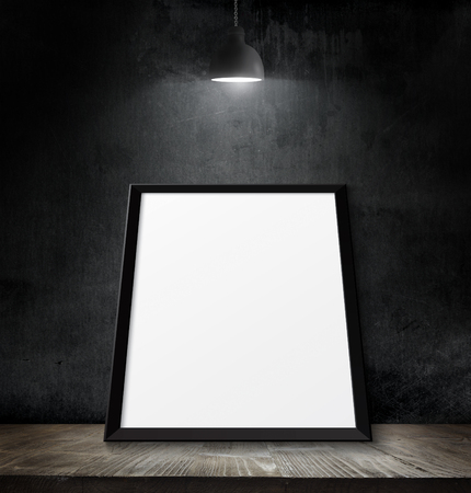 Empty poster over blackboard background with copy spaceの写真素材