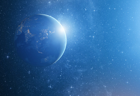 image of stars and a planet in the galaxy.の写真素材