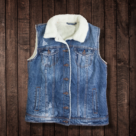 blue jeans jacket for women on woodの写真素材