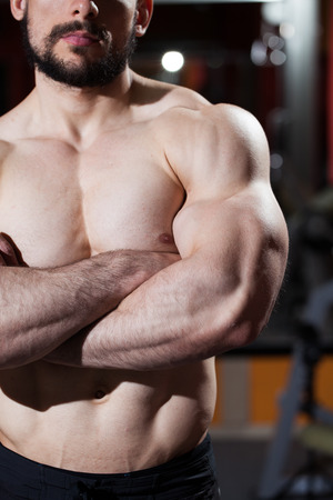 muscular bodybuilder on black backgroundの写真素材