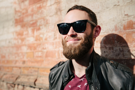 hipster man wearing sunglassesの写真素材