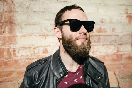 hipster man wearing sunglassesの写真素材