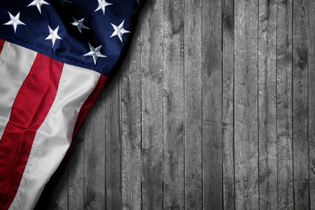 Flag of the USA on wooden backgroundの写真素材