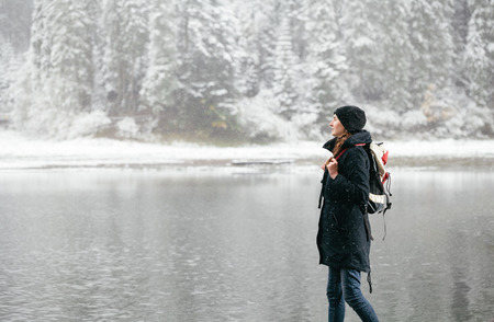Woman hiking in the nature in winterの写真素材