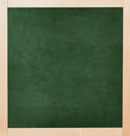 Black background or blackboard texture with wooden boarderの写真素材