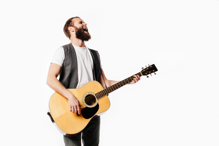 Guitar player playing and singingの写真素材