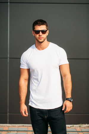 hipster wearing white blank t-shirt with spaceの写真素材