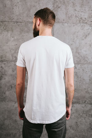Man wearing white blank t-shirt with space for your logoの写真素材