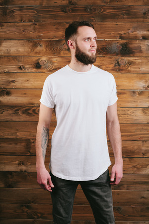Man wearing white blank t-shirt with space for your logoの写真素材