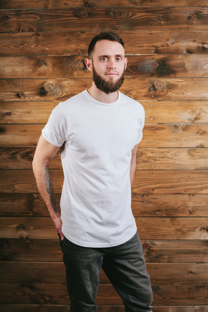 Man wearing white blank t-shirt with space for your logoの写真素材