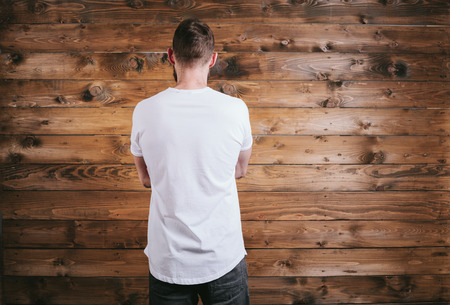 Man wearing white blank t-shirt with space for your logoの写真素材