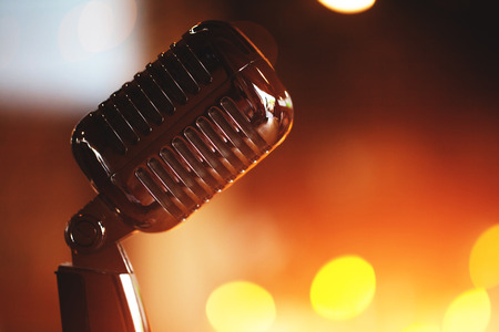 Microphone on a stage with concert lightの写真素材