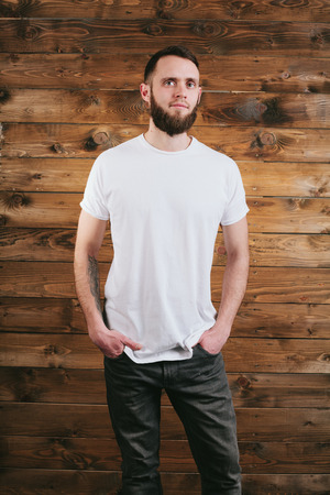 Man wearing white blank t-shirt with space for your logoの写真素材