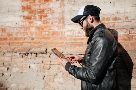 Hipster man with beard wearing glassesの写真素材