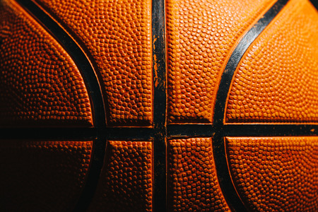 Basketball in a dark spaceの写真素材